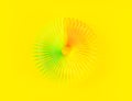 Colorful rainbow spiral plastic toy on yellow background