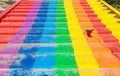 Colorful rainbow stairs. Stairs up from well in one of tourist attractions in Thailand.