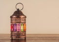 Colorful Ramadan lantern fanos on a wooden table Royalty Free Stock Photo