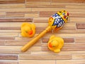 Colorful rattle baby toy isolated on bamboo background Royalty Free Stock Photo
