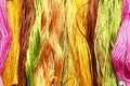 Colorful raw silk thread background. Royalty Free Stock Photo