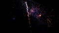 Colorful real fireworks at holiday night in slow motion