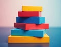 Colorful rectangular blocks stacked in decreasing size order. Red, blue, and yellow cubes form a pyramid shape. Simple, bright Royalty Free Stock Photo