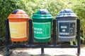 Colorful Recycle Bins In The Park, multicoloured garbage trash bins Environment Royalty Free Stock Photo