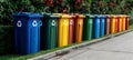 Colorful recycling bins for sorting different types of waste at collection point Royalty Free Stock Photo