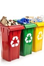 Colorful recycling bins for sorting different types of waste at collection point Royalty Free Stock Photo