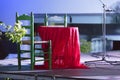 Colorful red flamenco shawl draped over a table