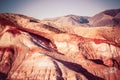 Colorful red rocks on a Sunny day. Beautiful view of the mountains of the Kyzyl-Chin Royalty Free Stock Photo