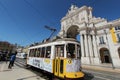 Colorful red tram at the Commerce Square of Lisbon in Spring Royalty Free Stock Photo