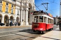 Colorful red tram at the Commerce Square of Lisbon in Spring Royalty Free Stock Photo