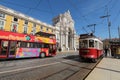 Colorful red tram at the Commerce Square of Lisbon in Spring Royalty Free Stock Photo