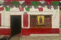 Colorful red and white storefront in Celestun, Mexico in Yucatan Peninsula, Mexico