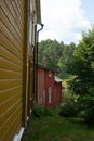 The colorful red wooden warehouses of Porvoo in Finland during a warm summer day - 7