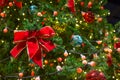 Colorful Red, Yellow and Green Christmas Tree Bokeh background of de focused glittering lights Royalty Free Stock Photo