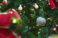 Colorful Red, Yellow and Green Christmas Tree Bokeh background of de focused glittering lights Royalty Free Stock Photo