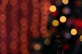 Colorful Red, Yellow and Green Christmas Tree Bokeh background of de focused glittering lights, Christmas background pattern Royalty Free Stock Photo