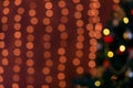 Colorful Red, Yellow and Green Christmas Tree Bokeh background of de focused glittering lights, Christmas background pattern Royalty Free Stock Photo