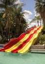 Colorful red and yellow water slide in aqua park.