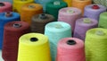 Colorful reels of threads background. textile