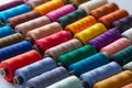 Colorful reels of threads background. Textile factory