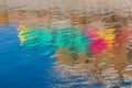 Colorful reflections in calm water
