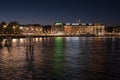 Geneva lakefront lights reflecting in Lake Geneva at night