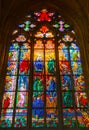 Colorful religious stained glass window, St. Vitus Cathedral in Royalty Free Stock Photo