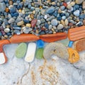 Colorful remains polished by the sea on the beach