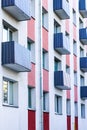 Colorful renovated and thermally insulated apartment house facade