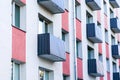 Colorful renovated and thermally insulated apartment house facade