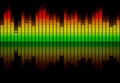 Colorful retro audio equalizer bars with sound spectrum colors from green to red isolated on black. Music or decibels wave Royalty Free Stock Photo