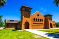 Colorful Retro Brick Building With Boarded Up Entrance