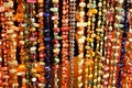 Colorful rhinestones necklaces hanging in a street stall Royalty Free Stock Photo