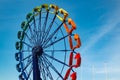 Colorful ride in motion in amusement park on sky background Royalty Free Stock Photo
