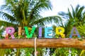 Colorful Riviera Maya swing lettering sign symbol on beach Mexico