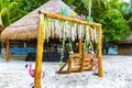 Colorful Riviera Maya swing lettering sign symbol on beach Mexico