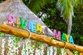 Colorful Riviera Maya swing lettering sign symbol on beach Mexico