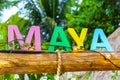 Colorful Riviera Maya swing lettering sign symbol on beach Mexico