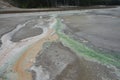 Colorful rivulets pouring from a thermal pool at yellowstone park.