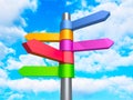 Colorful Road Direction Arrows Signs On Blue Cloud Sky background