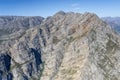 colorful rock layers of cliffs at Jan du Toit\'s peak summit aerial, Worcester, South Africa Royalty Free Stock Photo