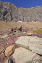 Colorful Rocks Below a Mountain Ridge Royalty Free Stock Photo