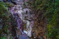 Colorful rocks, water erosion, a small waterfall Royalty Free Stock Photo