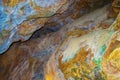 Colorful rocks of Zoodochos Pigi Cave Mesa Vouno Santorini Greece