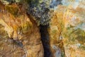 Colorful rocks of Zoodochos Pigi Cave Mesa Vouno Santorini Greece