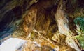 Colorful rocks of Zoodochos Pigi Cave Mesa Vouno Santorini Greece