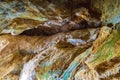 Colorful rocks of Zoodochos Pigi Cave Mesa Vouno Santorini Greece