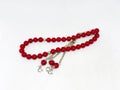 Colorful rosary varieties, white background.