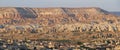 Colorful Rose valley mountain with blue sky in Cappadocia, Red canyon in Goreme village, Turkey. Royalty Free Stock Photo