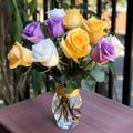 Colorful Roses In A Vase: A Ballet Of Purple, Yellow, And Orange Royalty Free Stock Photo